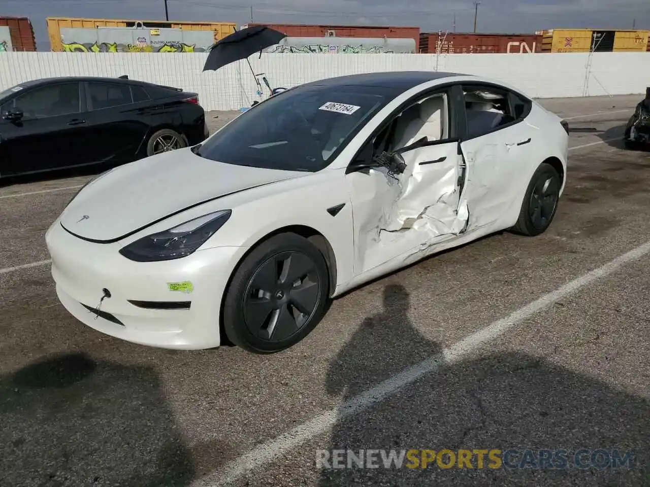 1 Photograph of a damaged car 5YJ3E1EA6NF322897 TESLA MODEL 3 2022