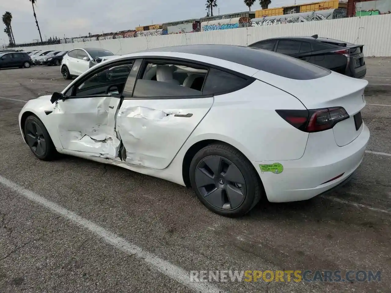 2 Photograph of a damaged car 5YJ3E1EA6NF322897 TESLA MODEL 3 2022