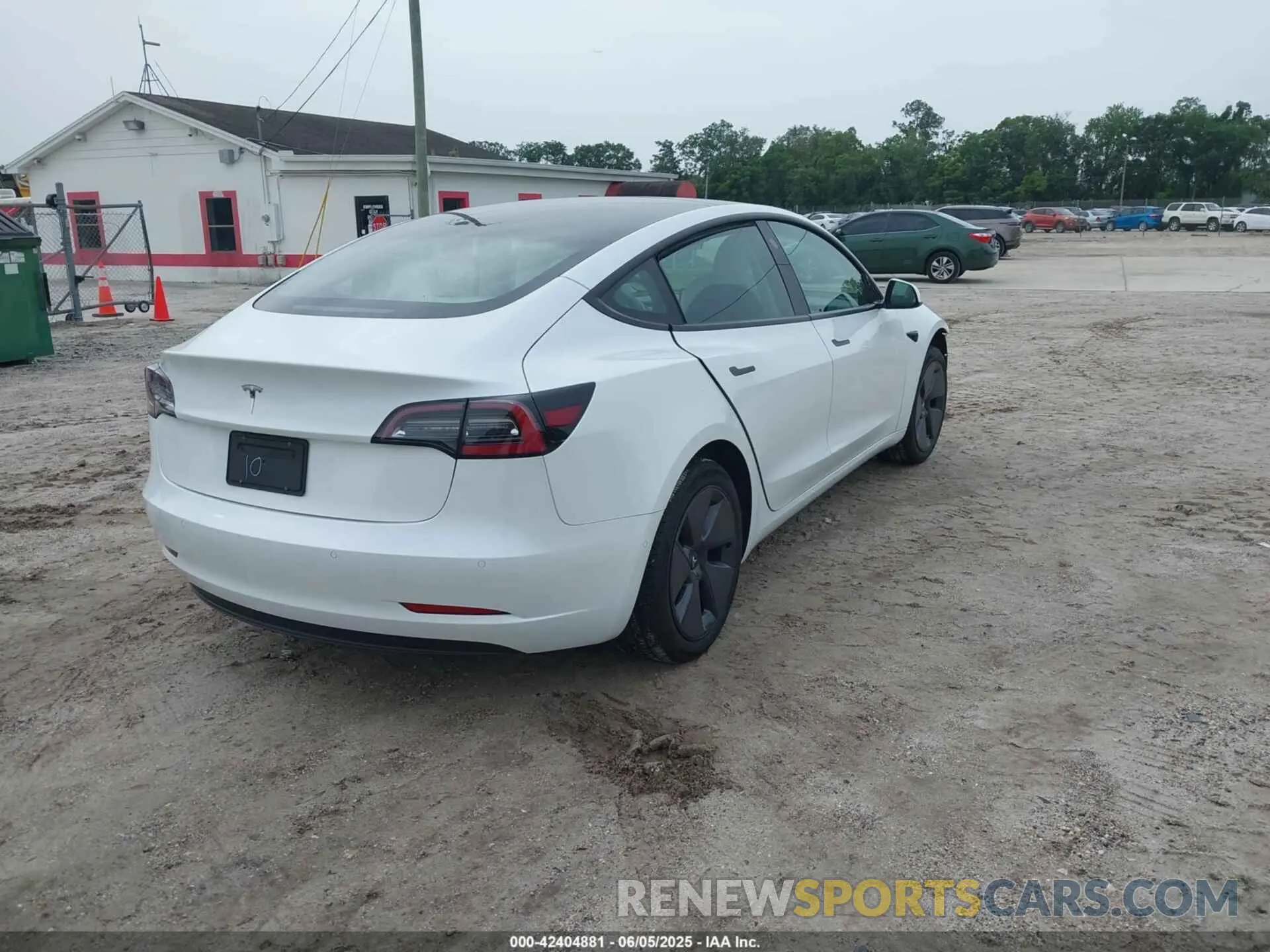 4 Photograph of a damaged car 5YJ3E1EA6NF344222 TESLA MODEL 3 2022