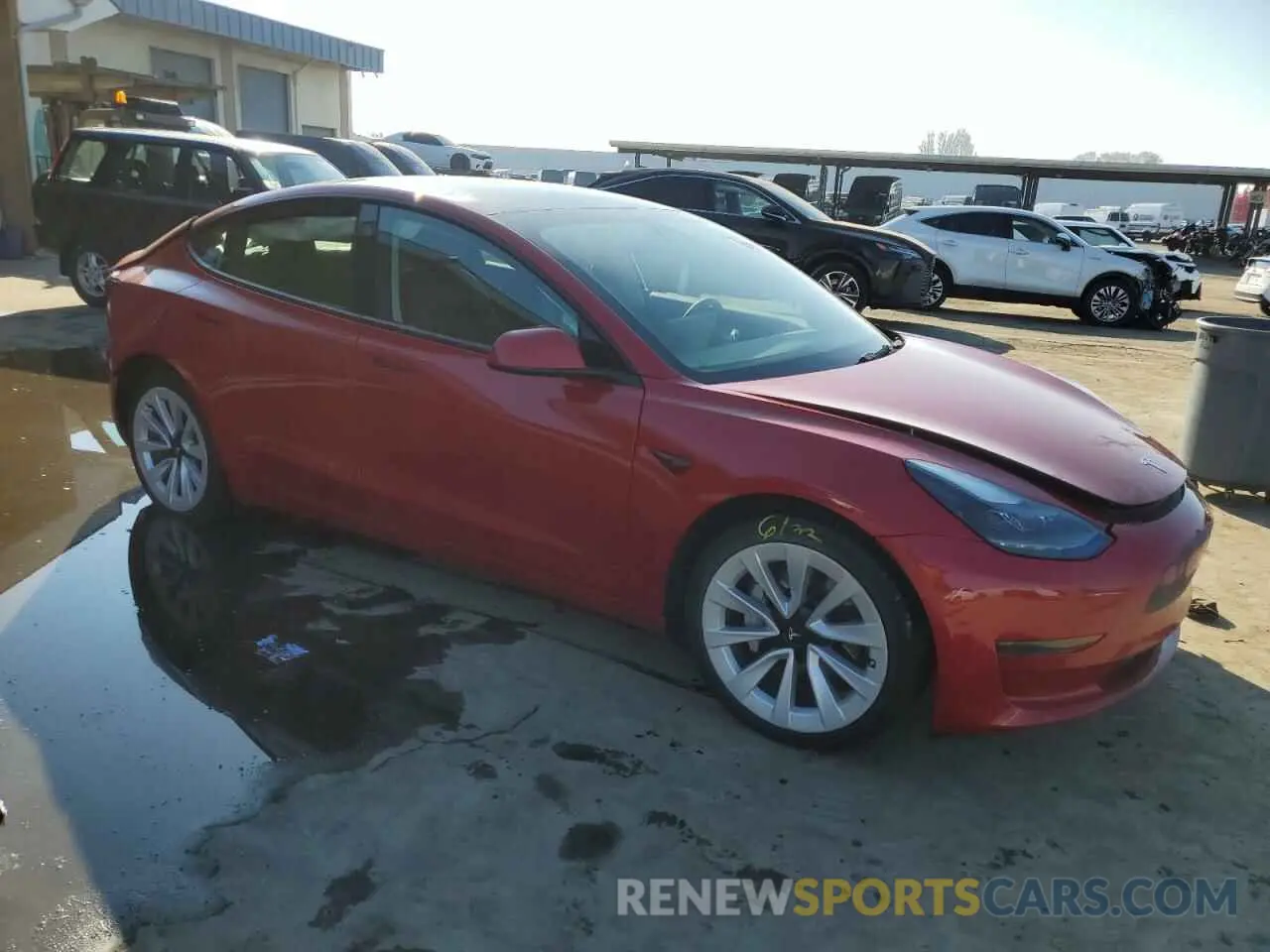 4 Photograph of a damaged car 5YJ3E1EA6NF344771 TESLA MODEL 3 2022