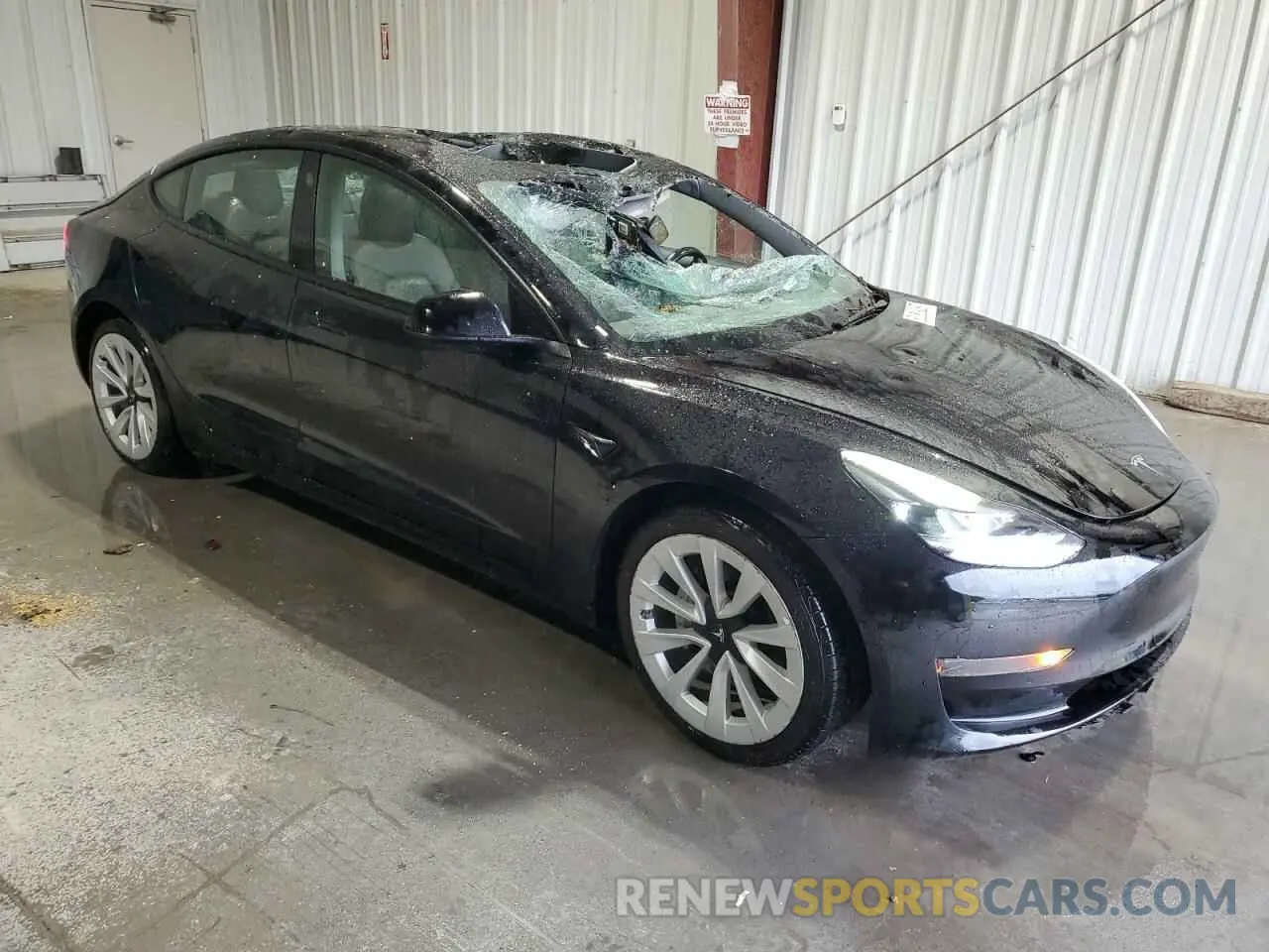 4 Photograph of a damaged car 5YJ3E1EA6NF369993 TESLA MODEL 3 2022