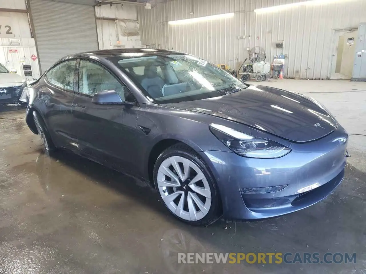 4 Photograph of a damaged car 5YJ3E1EA6NF370965 TESLA MODEL 3 2022