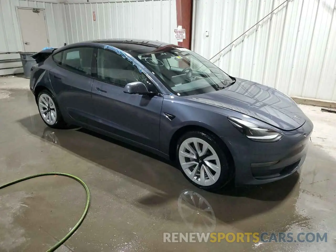 4 Photograph of a damaged car 5YJ3E1EA6NF371484 TESLA MODEL 3 2022