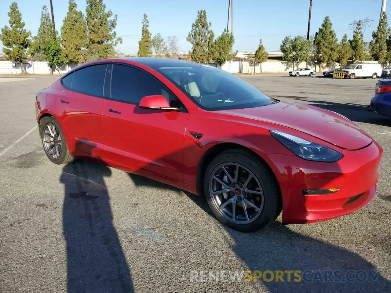 4 Photograph of a damaged car 5YJ3E1EA7NF132574 TESLA MODEL 3 2022