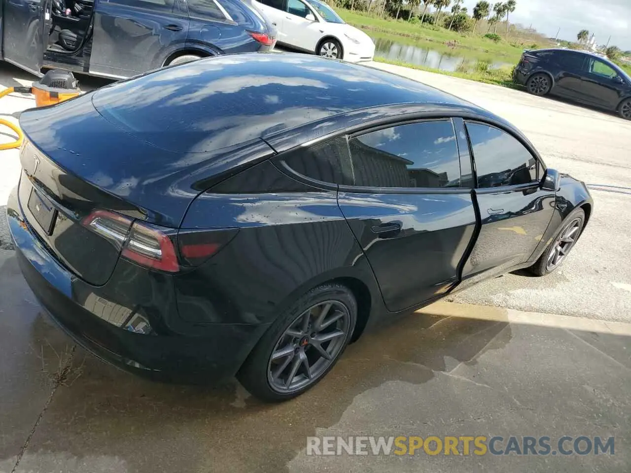 3 Photograph of a damaged car 5YJ3E1EA7NF186733 TESLA MODEL 3 2022