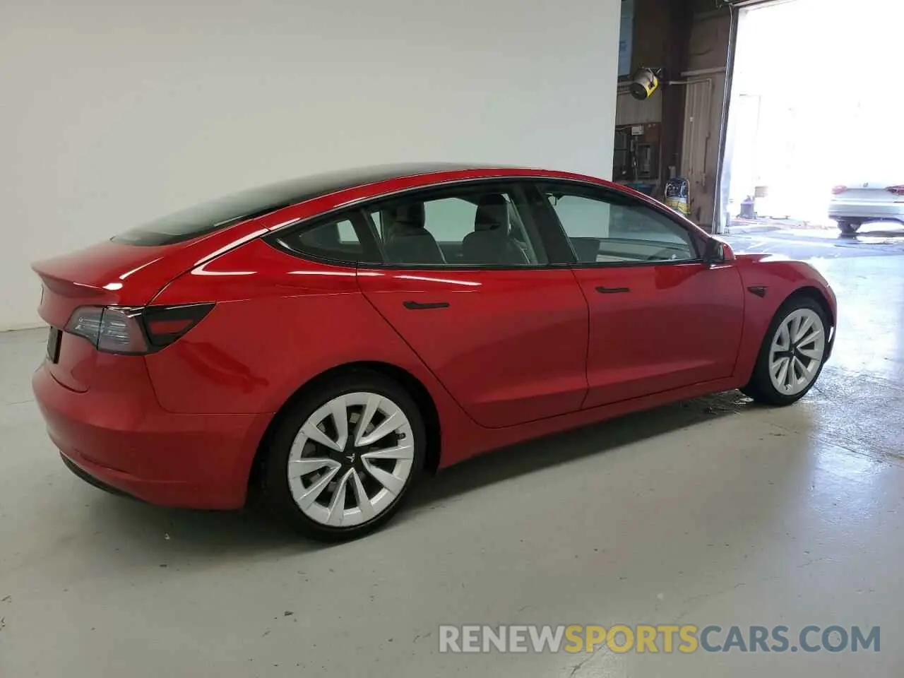 3 Photograph of a damaged car 5YJ3E1EA7NF188899 TESLA MODEL 3 2022