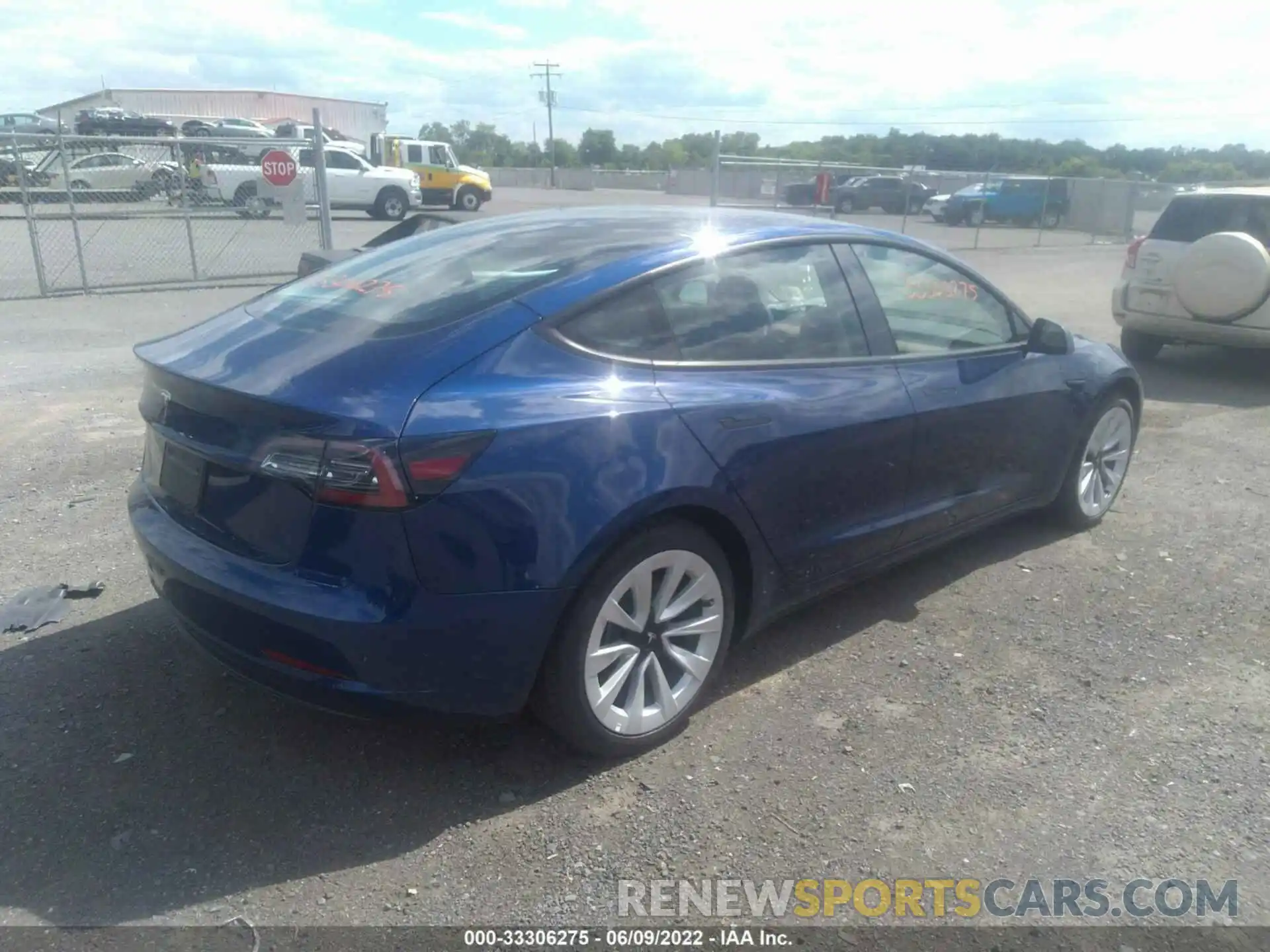 4 Photograph of a damaged car 5YJ3E1EA7NF190233 TESLA MODEL 3 2022