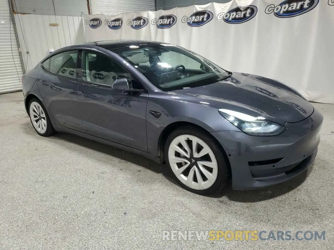 4 Photograph of a damaged car 5YJ3E1EA7NF191429 TESLA MODEL 3 2022