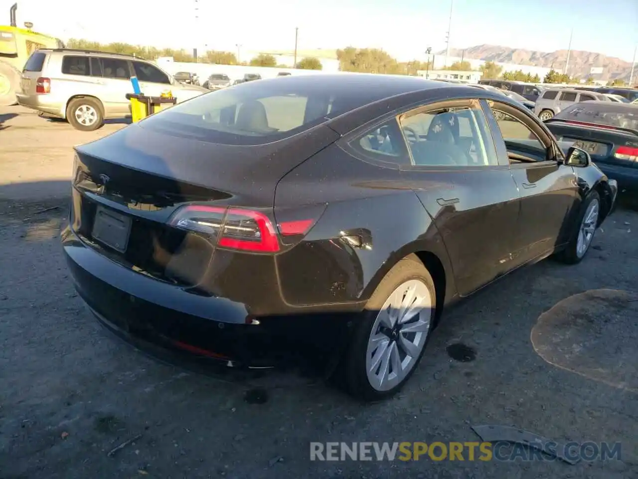 4 Photograph of a damaged car 5YJ3E1EA7NF285794 TESLA MODEL 3 2022