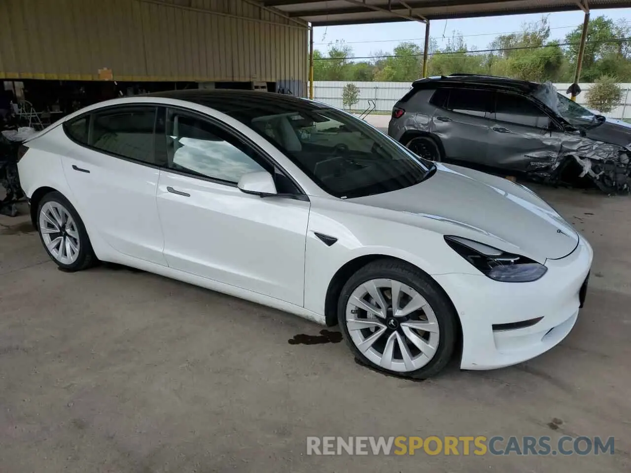 4 Photograph of a damaged car 5YJ3E1EA7NF287786 TESLA MODEL 3 2022