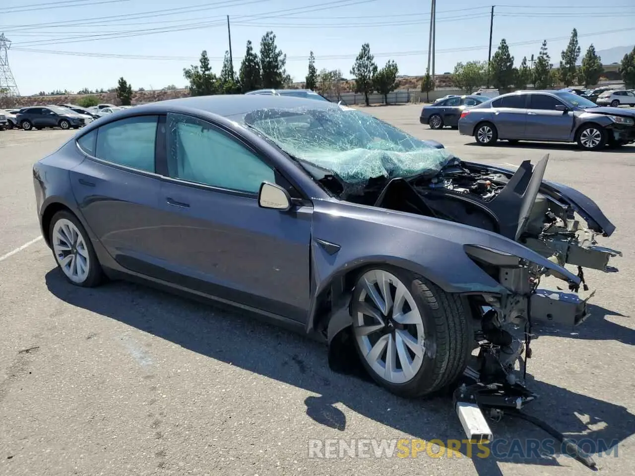4 Photograph of a damaged car 5YJ3E1EA7NF294284 TESLA MODEL 3 2022