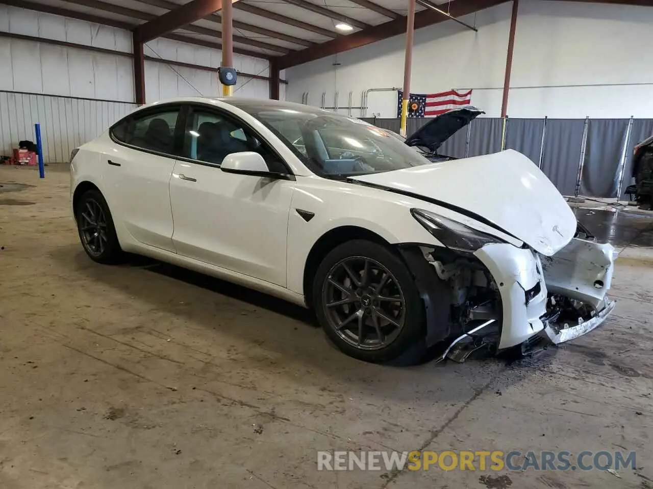 4 Photograph of a damaged car 5YJ3E1EA7NF322276 TESLA MODEL 3 2022