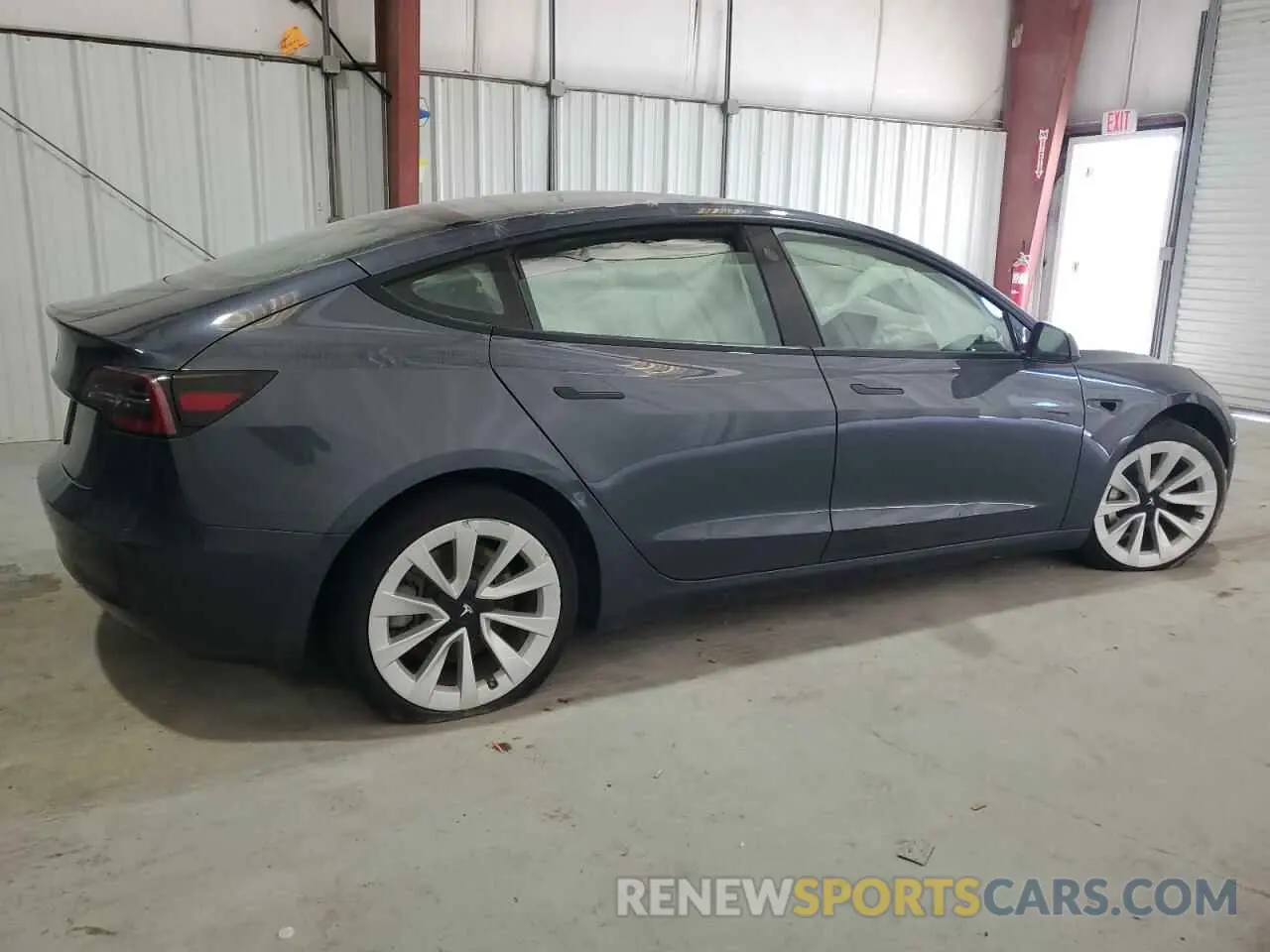 3 Photograph of a damaged car 5YJ3E1EA7NF370022 TESLA MODEL 3 2022