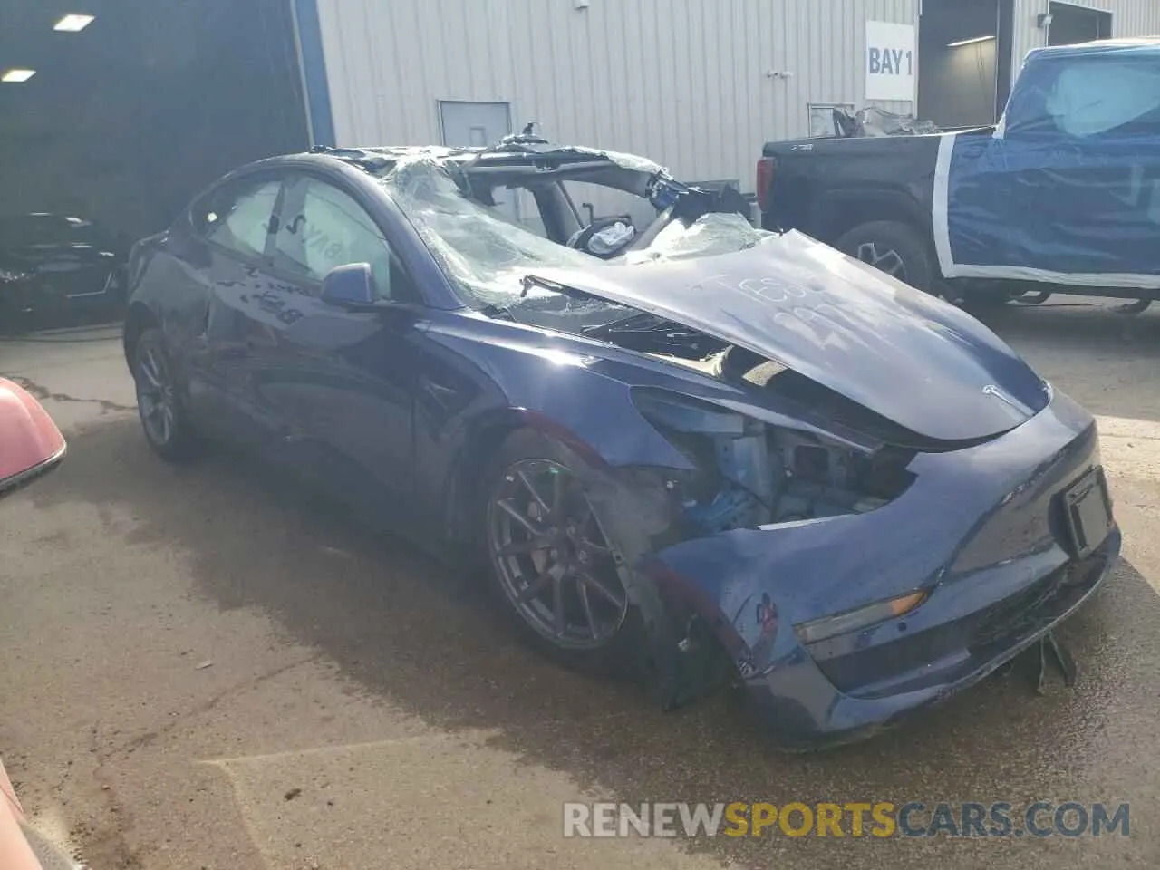 4 Photograph of a damaged car 5YJ3E1EA7NF370067 TESLA MODEL 3 2022
