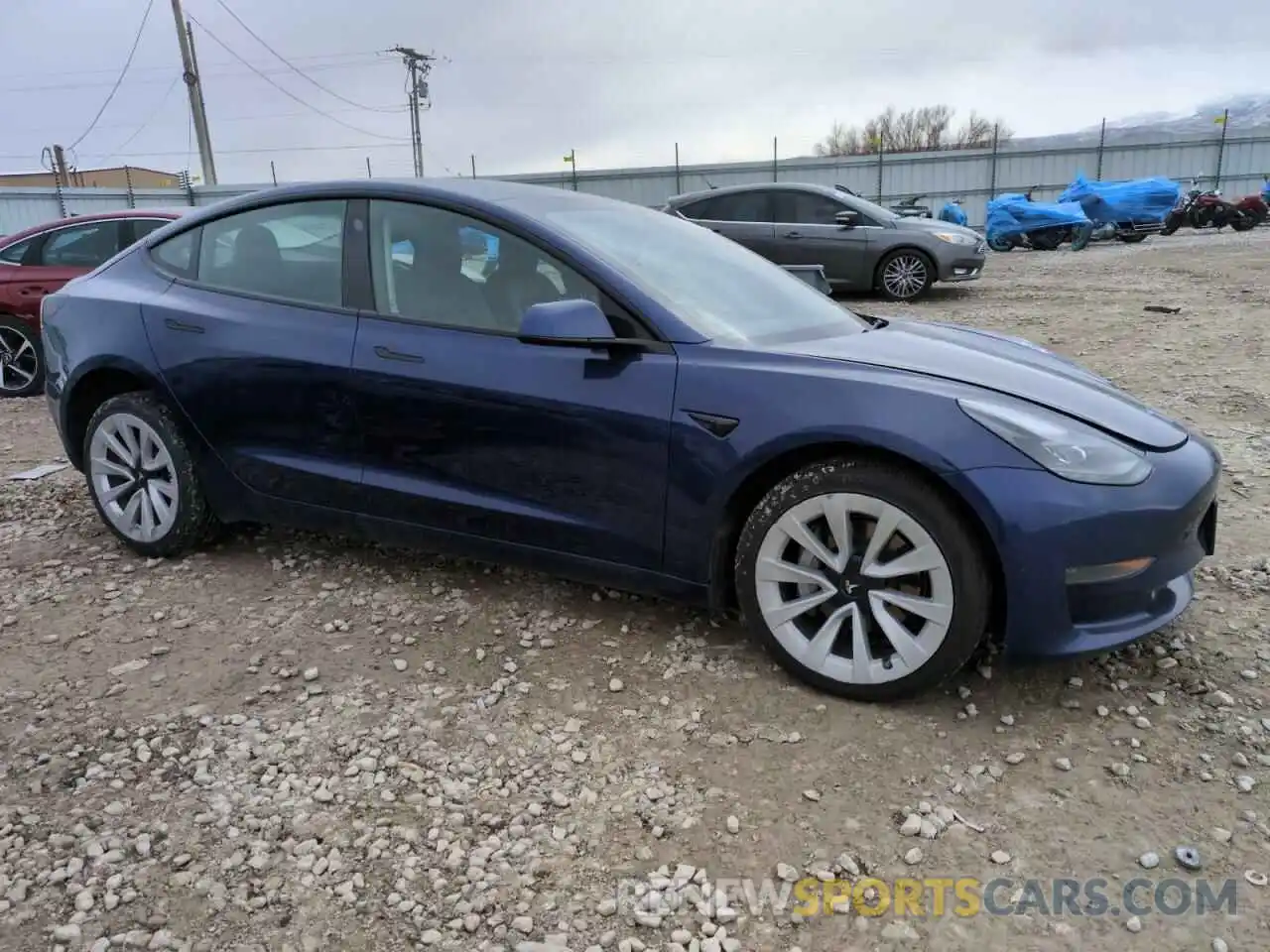 4 Photograph of a damaged car 5YJ3E1EA7NF371901 TESLA MODEL 3 2022