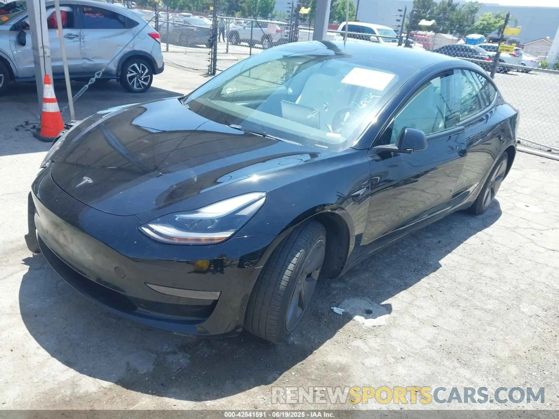 2 Photograph of a damaged car 5YJ3E1EA7NF373647 TESLA MODEL 3 2022