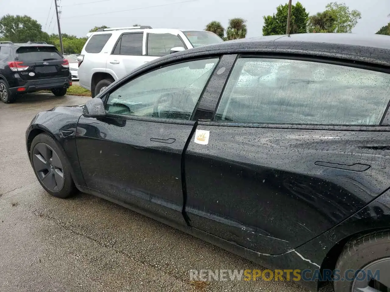 12 Photograph of a damaged car 5YJ3E1EA8NF120675 TESLA MODEL 3 2022