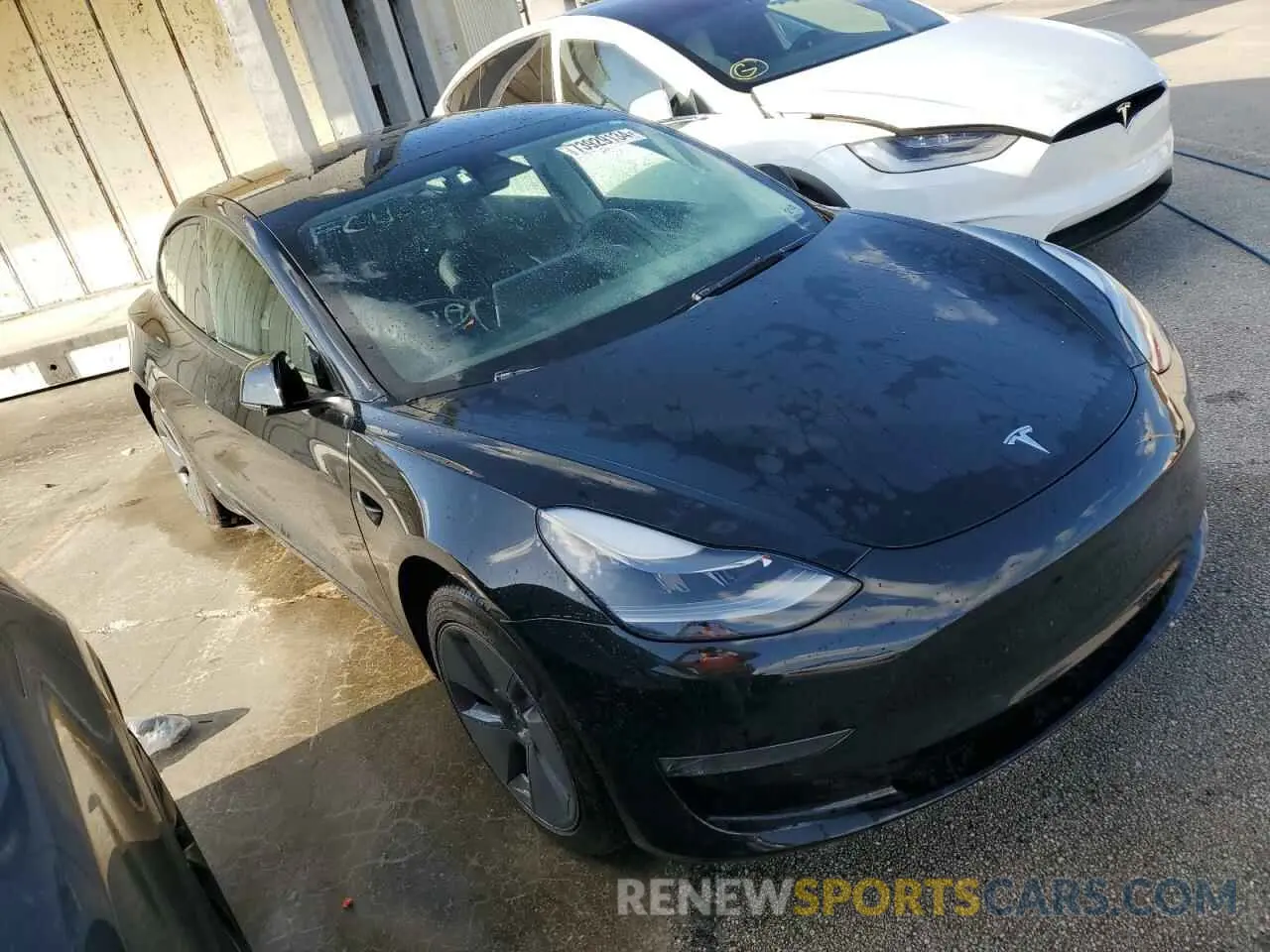 4 Photograph of a damaged car 5YJ3E1EA8NF120675 TESLA MODEL 3 2022