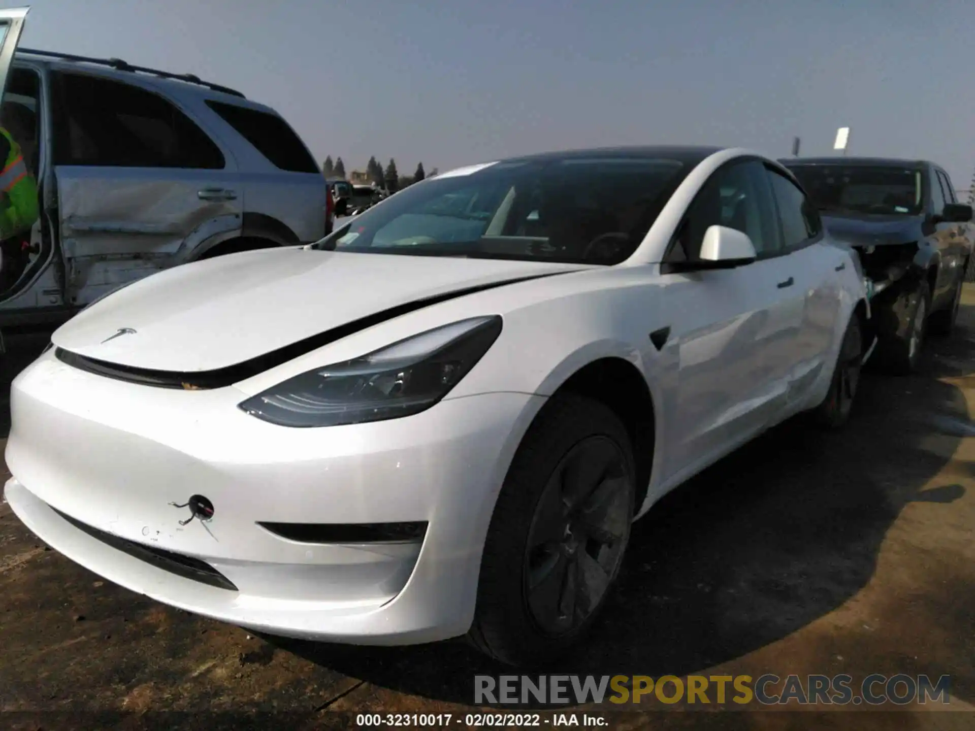 2 Photograph of a damaged car 5YJ3E1EA8NF122863 TESLA MODEL 3 2022