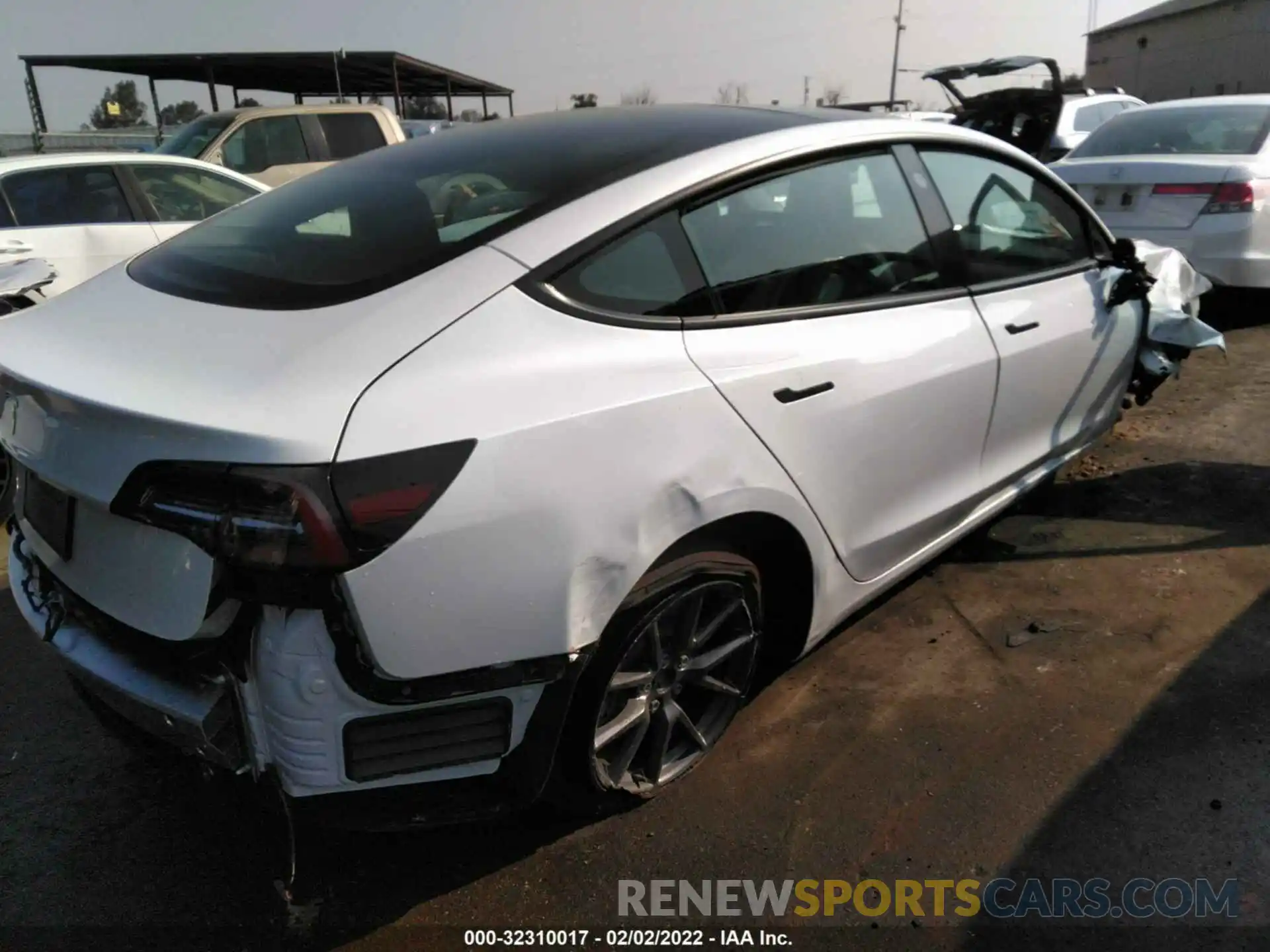 4 Photograph of a damaged car 5YJ3E1EA8NF122863 TESLA MODEL 3 2022