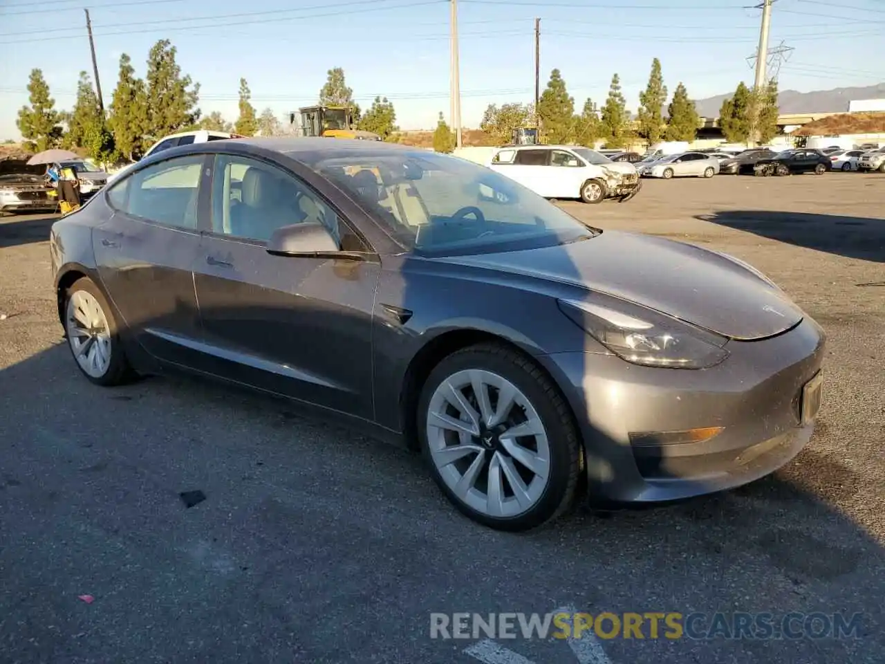 4 Photograph of a damaged car 5YJ3E1EA8NF143499 TESLA MODEL 3 2022