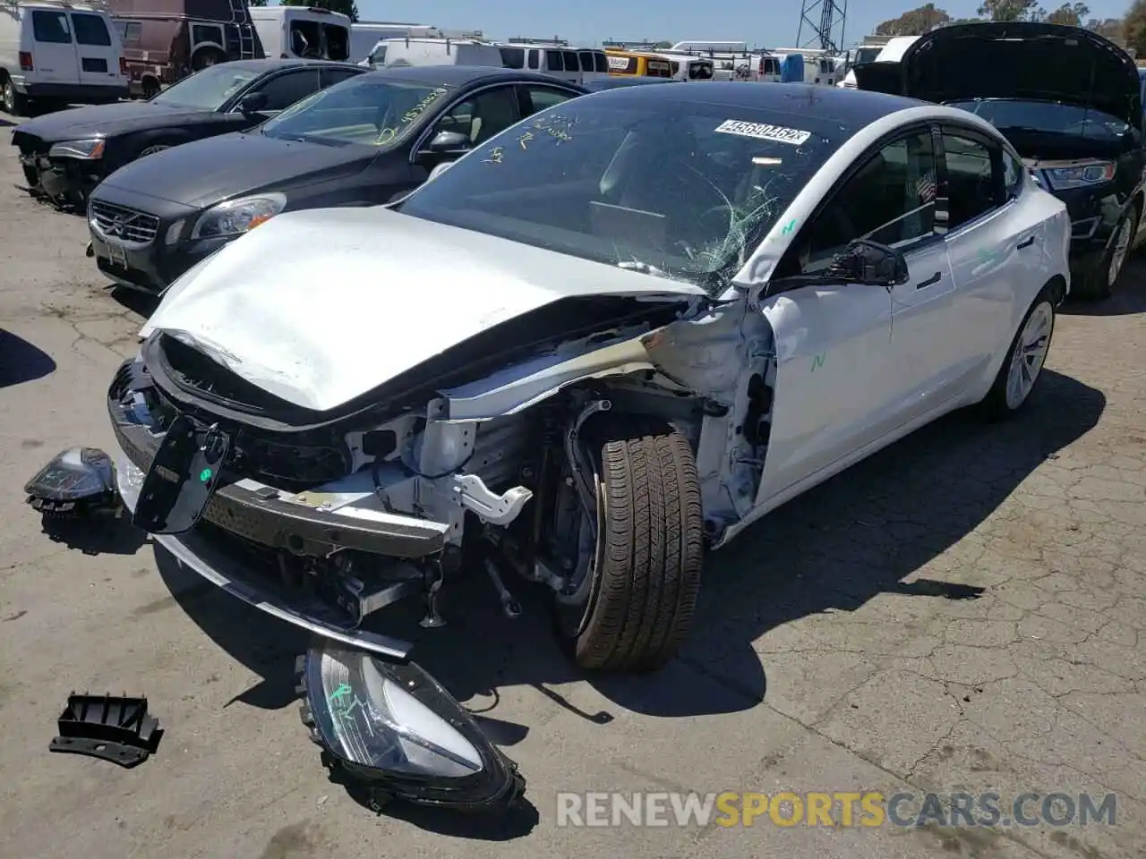 2 Photograph of a damaged car 5YJ3E1EA8NF145155 TESLA MODEL 3 2022