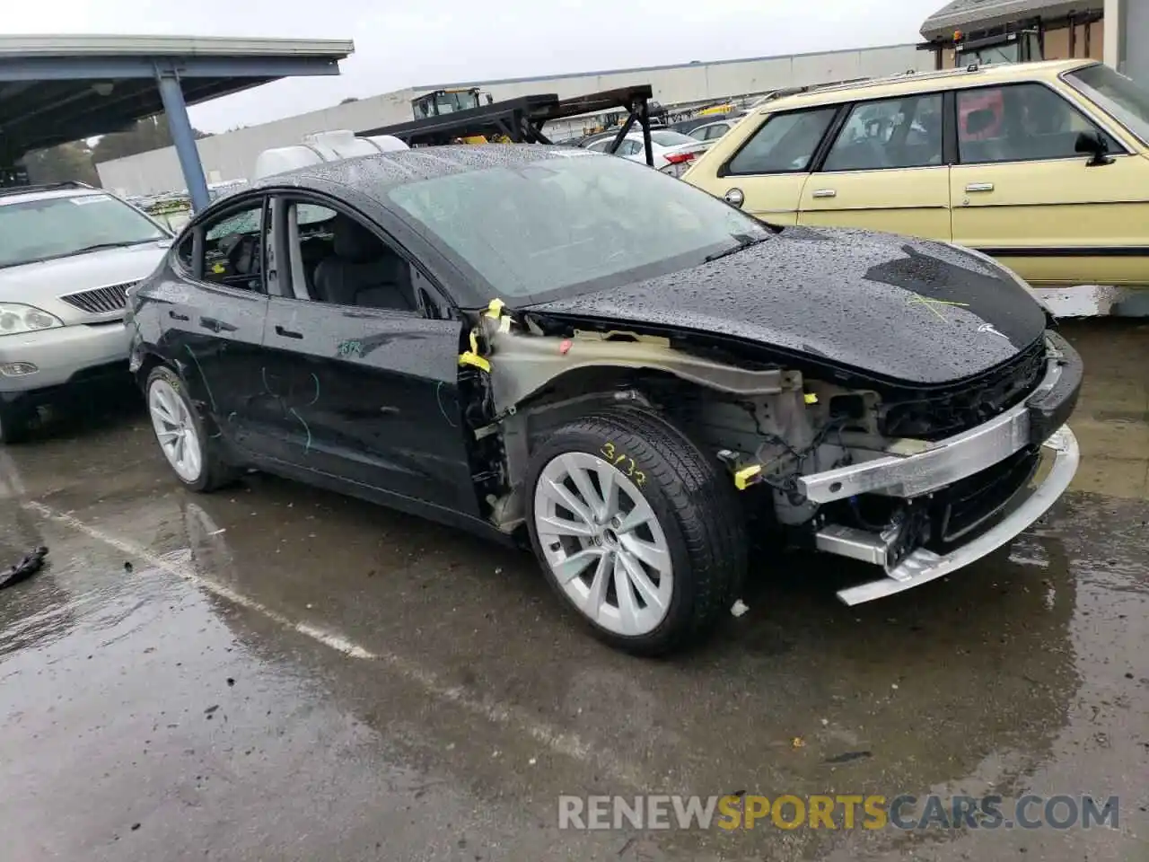 4 Photograph of a damaged car 5YJ3E1EA8NF188054 TESLA MODEL 3 2022