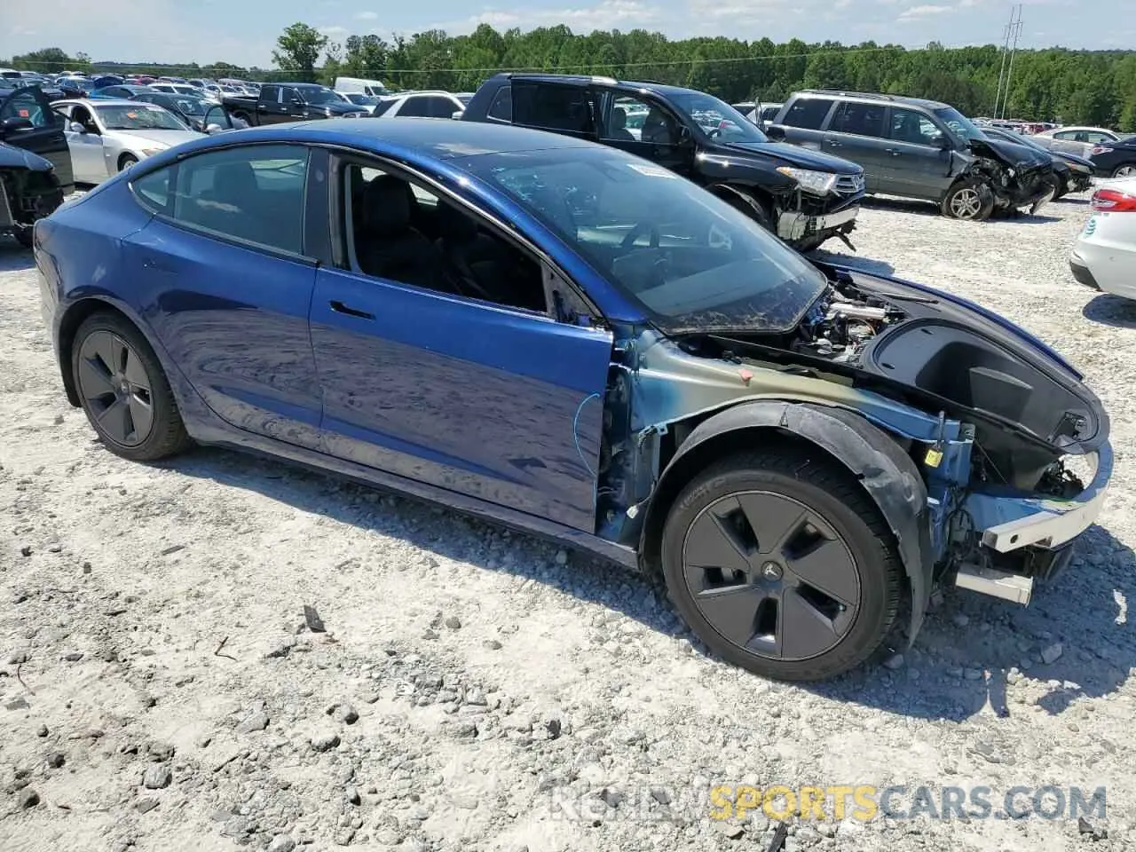 4 Photograph of a damaged car 5YJ3E1EA8NF188152 TESLA MODEL 3 2022