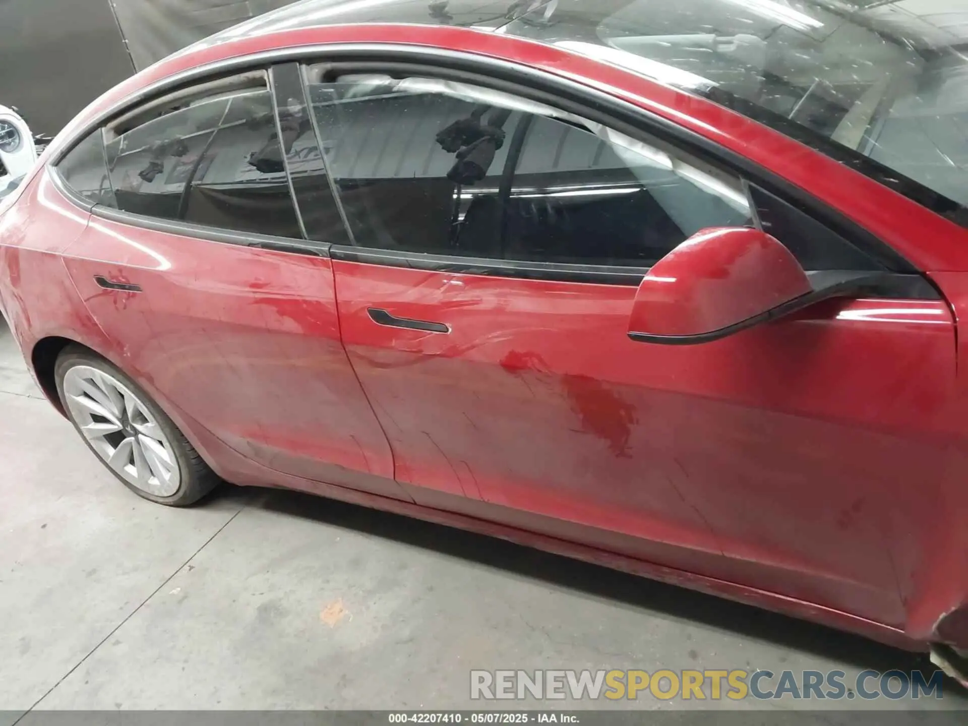 12 Photograph of a damaged car 5YJ3E1EA8NF188927 TESLA MODEL 3 2022