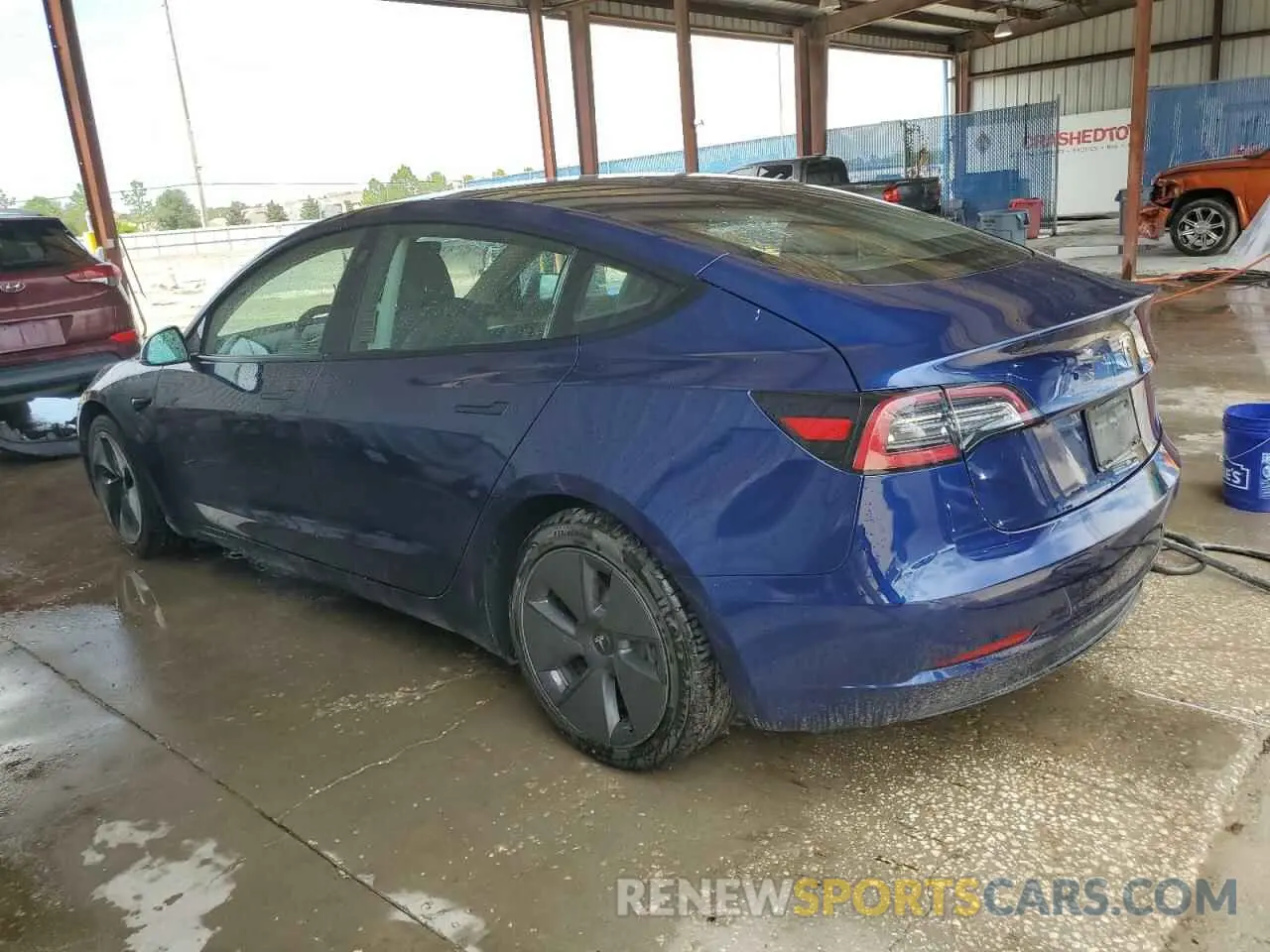 2 Photograph of a damaged car 5YJ3E1EA8NF189947 TESLA MODEL 3 2022