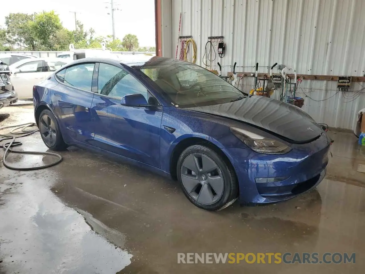 4 Photograph of a damaged car 5YJ3E1EA8NF189947 TESLA MODEL 3 2022