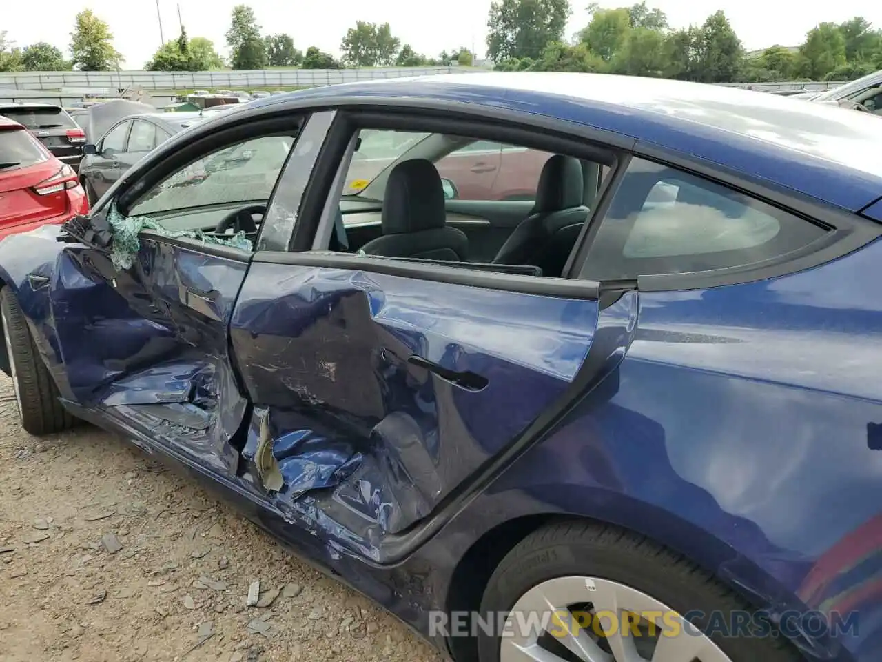 9 Photograph of a damaged car 5YJ3E1EA8NF192086 TESLA MODEL 3 2022