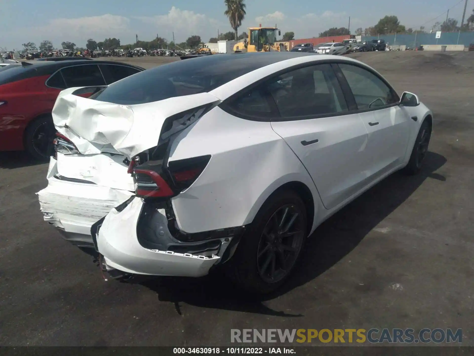 4 Photograph of a damaged car 5YJ3E1EA8NF210196 TESLA MODEL 3 2022