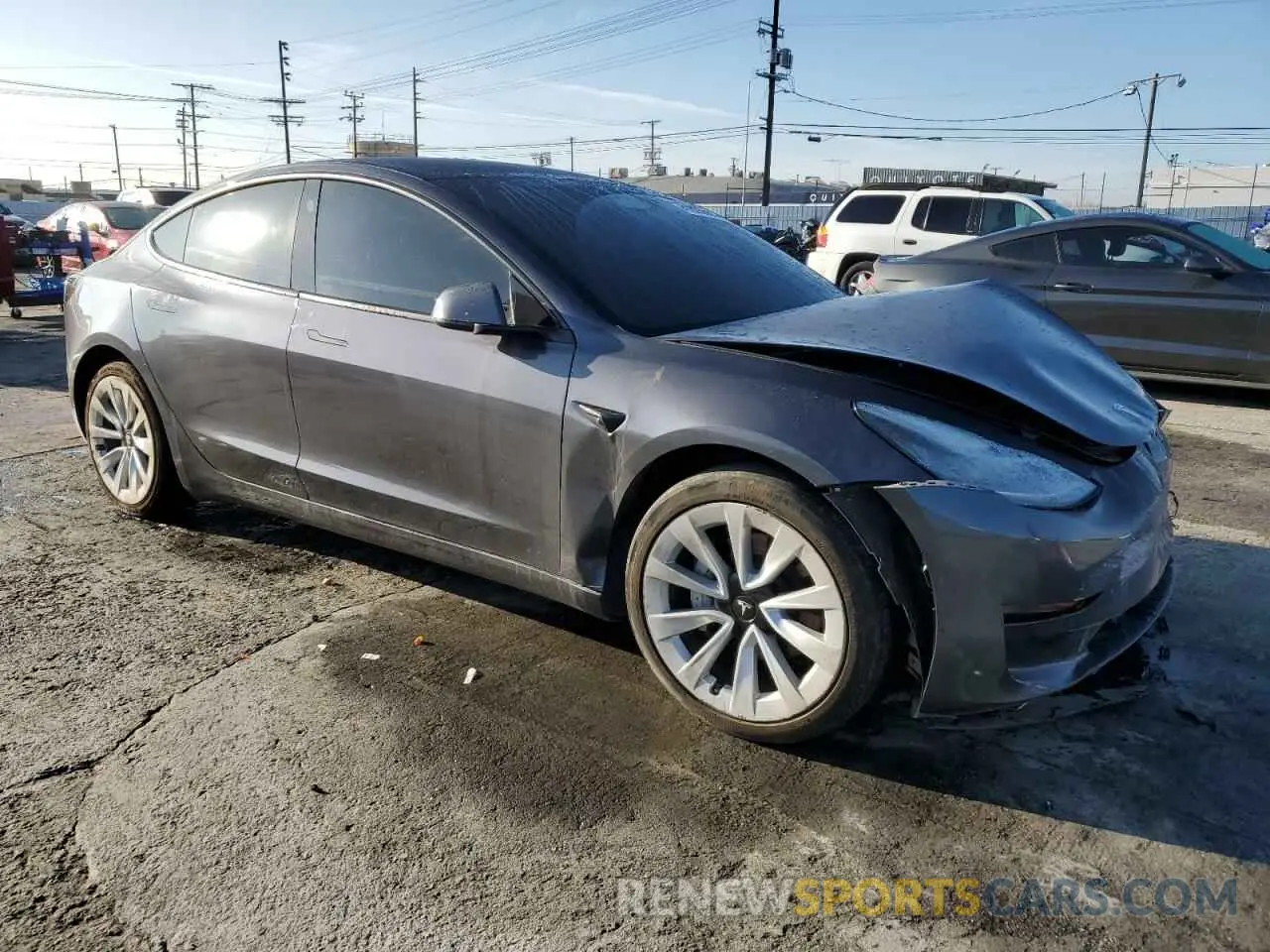 4 Photograph of a damaged car 5YJ3E1EA8NF243831 TESLA MODEL 3 2022