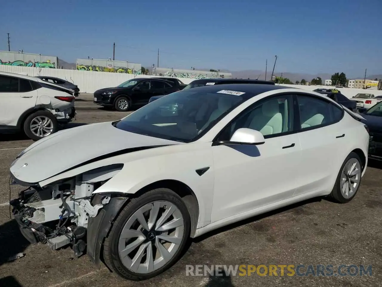 1 Photograph of a damaged car 5YJ3E1EA8NF244929 TESLA MODEL 3 2022