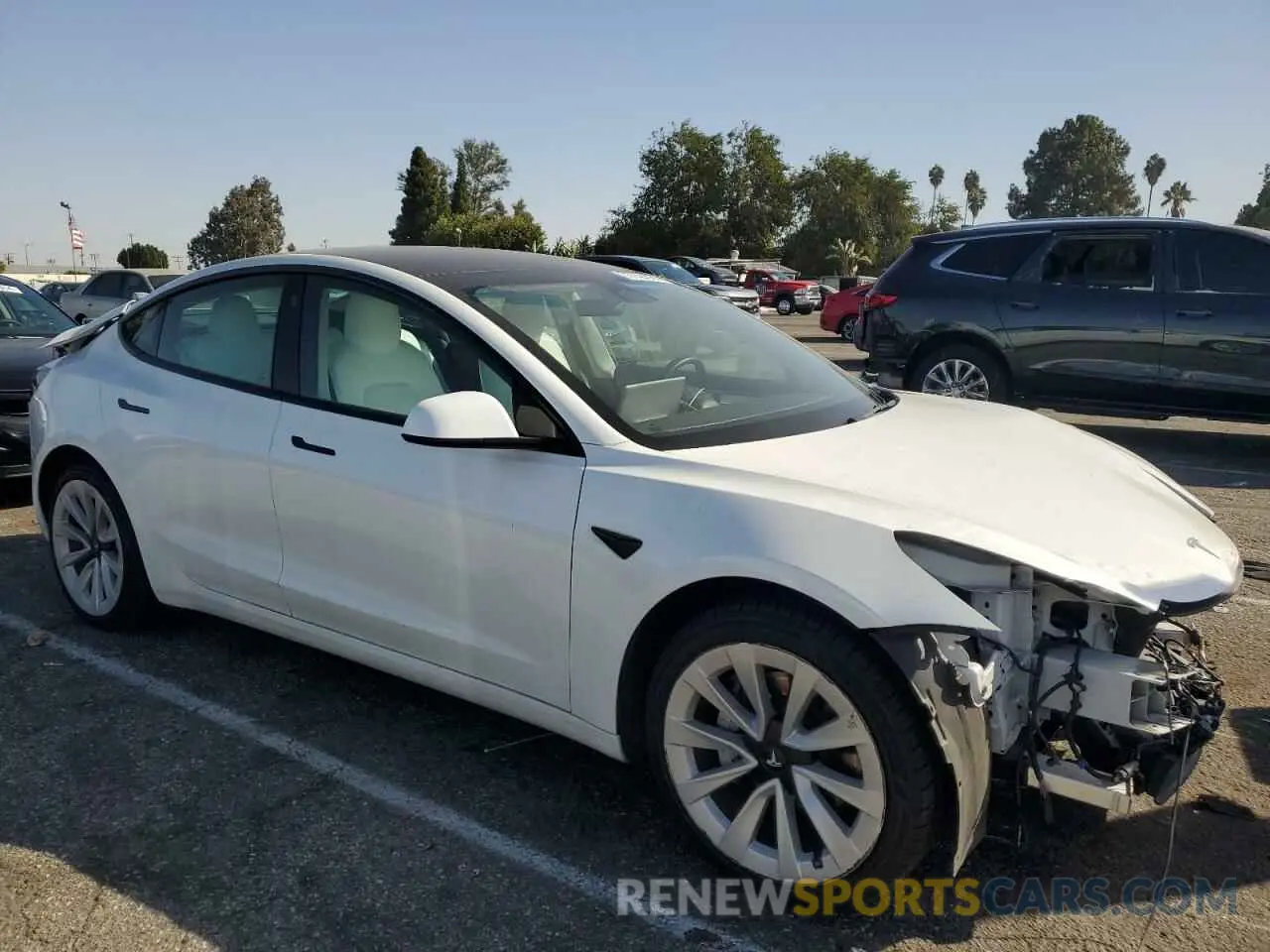 4 Photograph of a damaged car 5YJ3E1EA8NF244929 TESLA MODEL 3 2022
