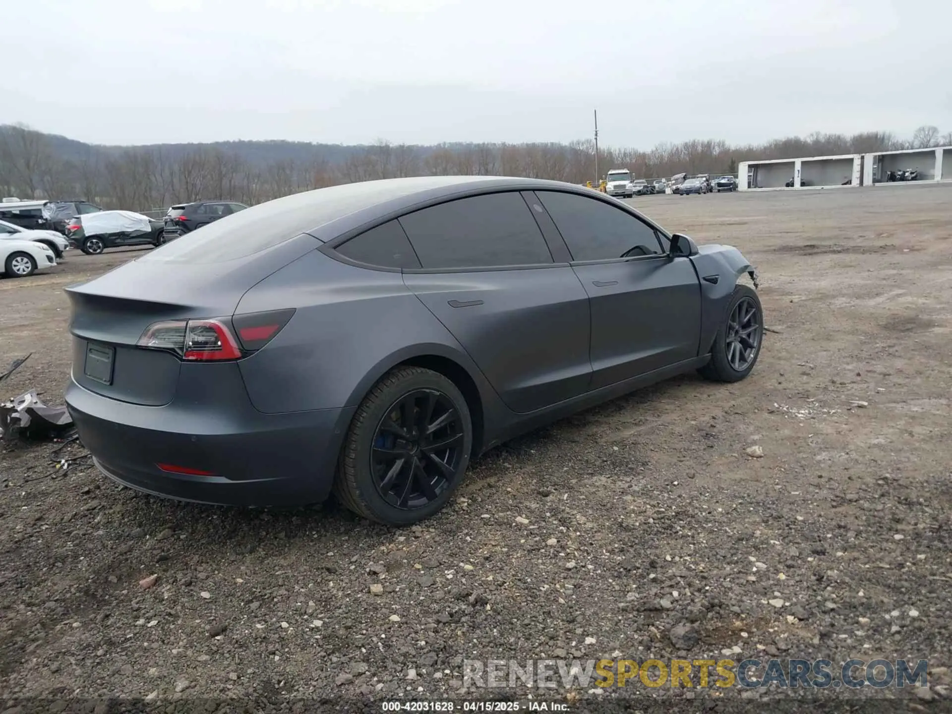 4 Photograph of a damaged car 5YJ3E1EA8NF344044 TESLA MODEL 3 2022
