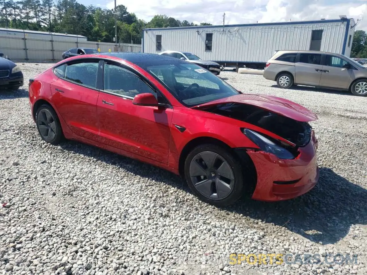 4 Photograph of a damaged car 5YJ3E1EA8NF353679 TESLA MODEL 3 2022