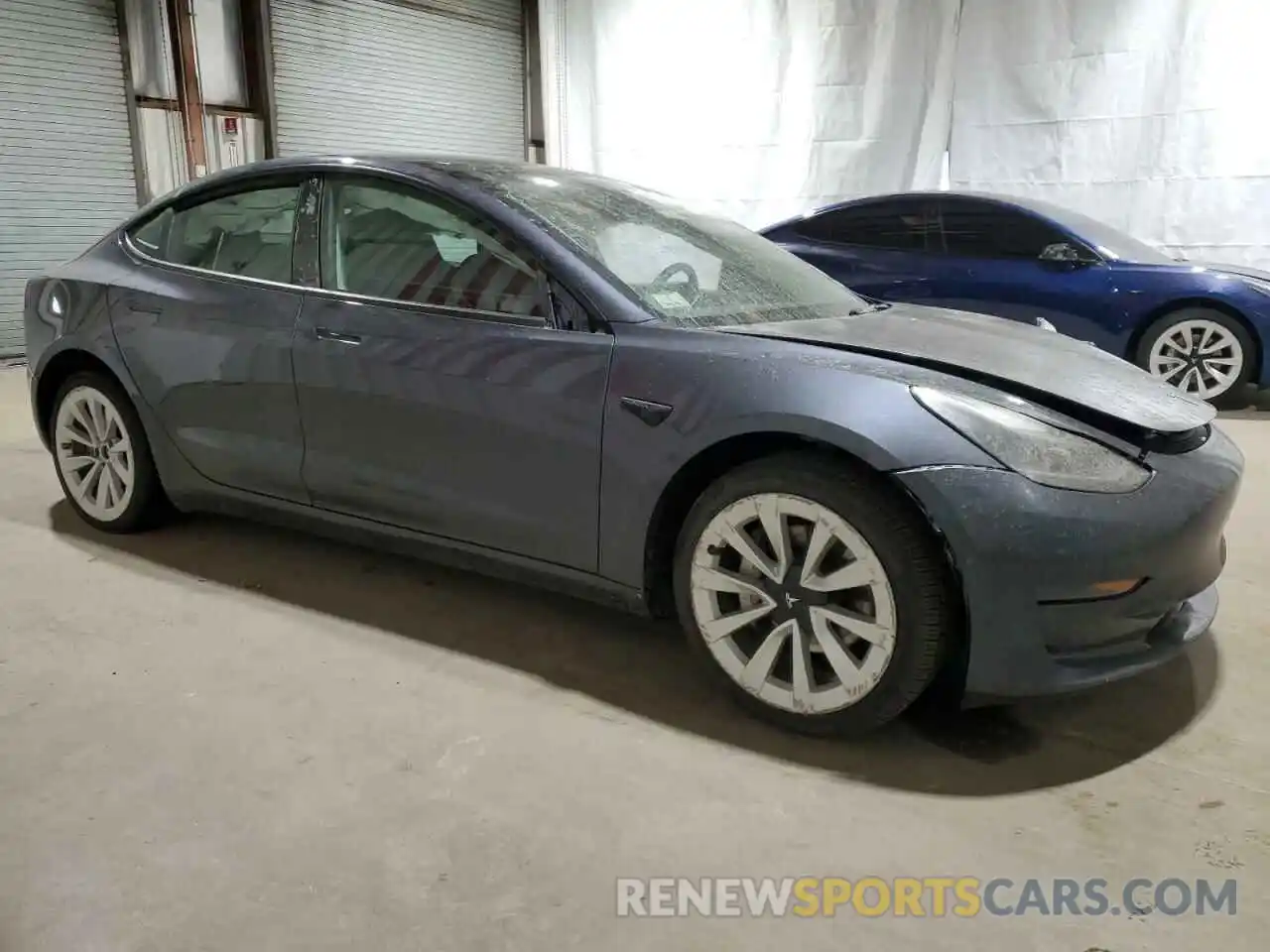 4 Photograph of a damaged car 5YJ3E1EA8NF371759 TESLA MODEL 3 2022