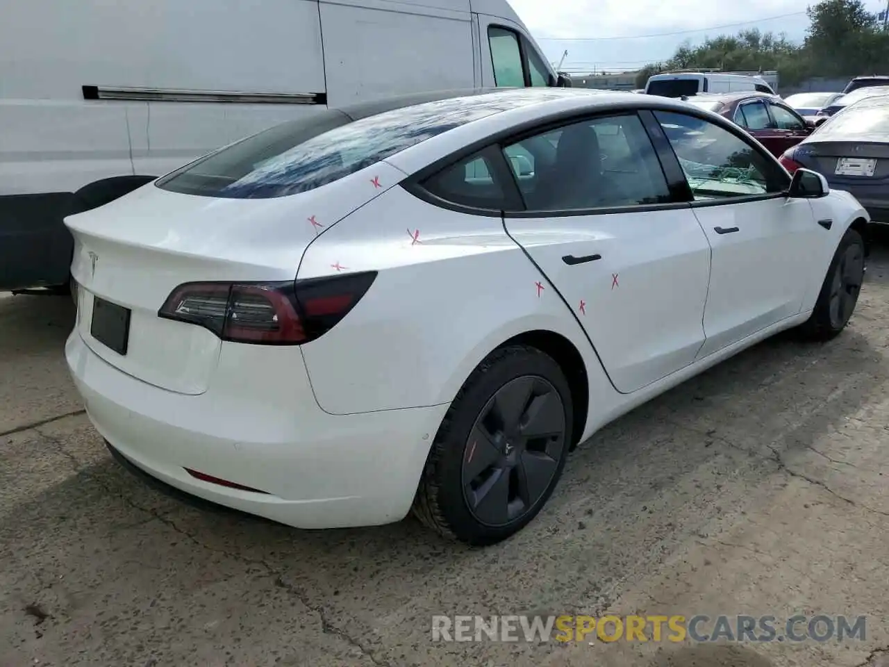 4 Photograph of a damaged car 5YJ3E1EA9NF113461 TESLA MODEL 3 2022