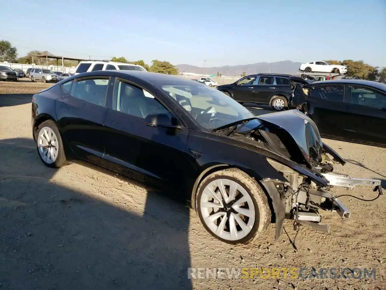 4 Photograph of a damaged car 5YJ3E1EA9NF185809 TESLA MODEL 3 2022