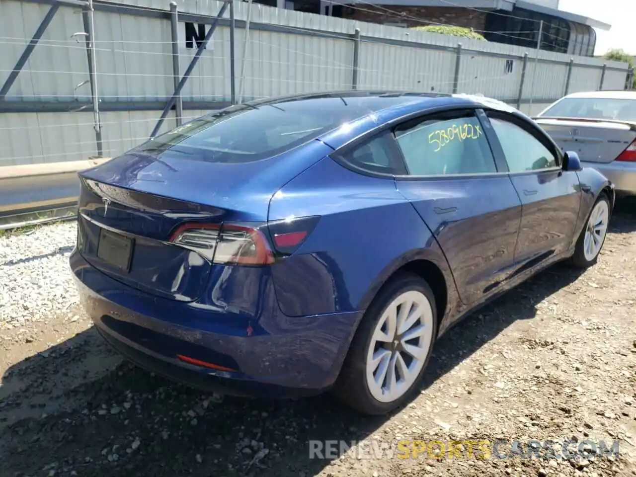 4 Photograph of a damaged car 5YJ3E1EA9NF187351 TESLA MODEL 3 2022