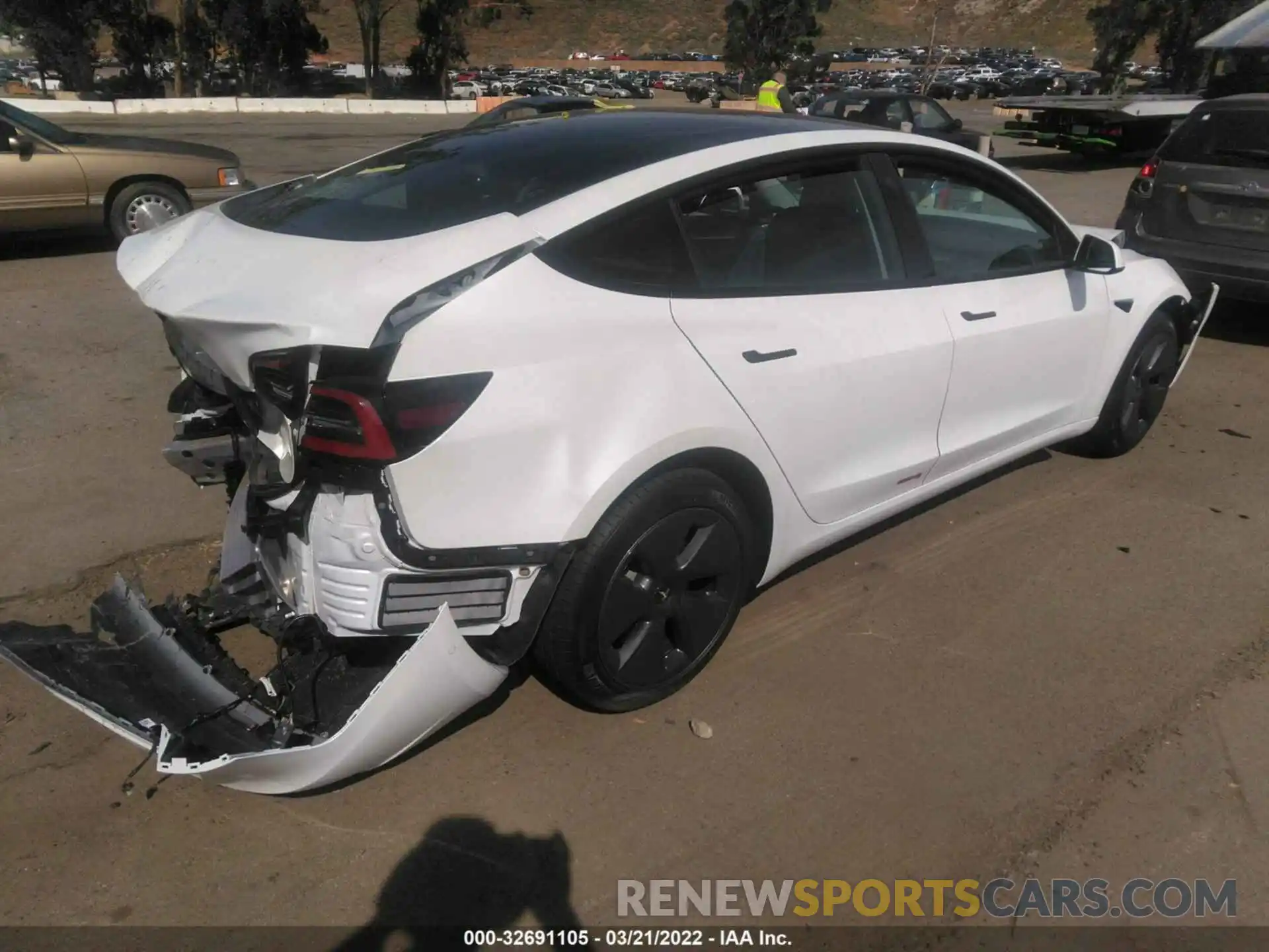 4 Photograph of a damaged car 5YJ3E1EA9NF201541 TESLA MODEL 3 2022