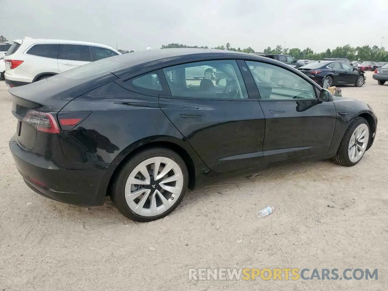 3 Photograph of a damaged car 5YJ3E1EA9NF201815 TESLA MODEL 3 2022