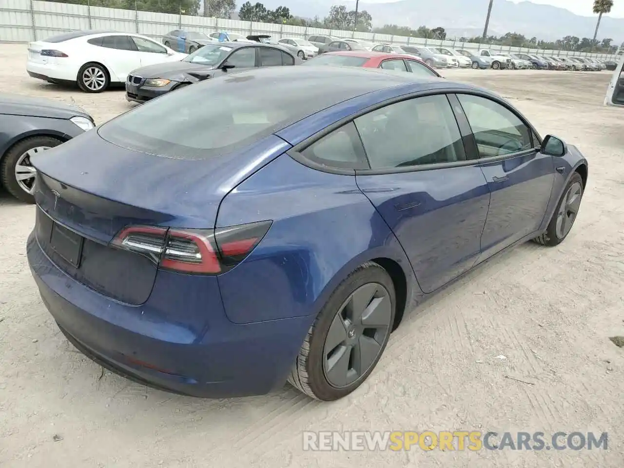 4 Photograph of a damaged car 5YJ3E1EA9NF212815 TESLA MODEL 3 2022