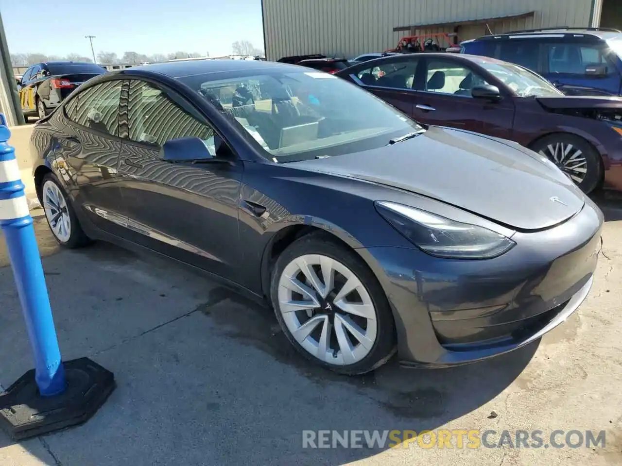 4 Photograph of a damaged car 5YJ3E1EA9NF286428 TESLA MODEL 3 2022