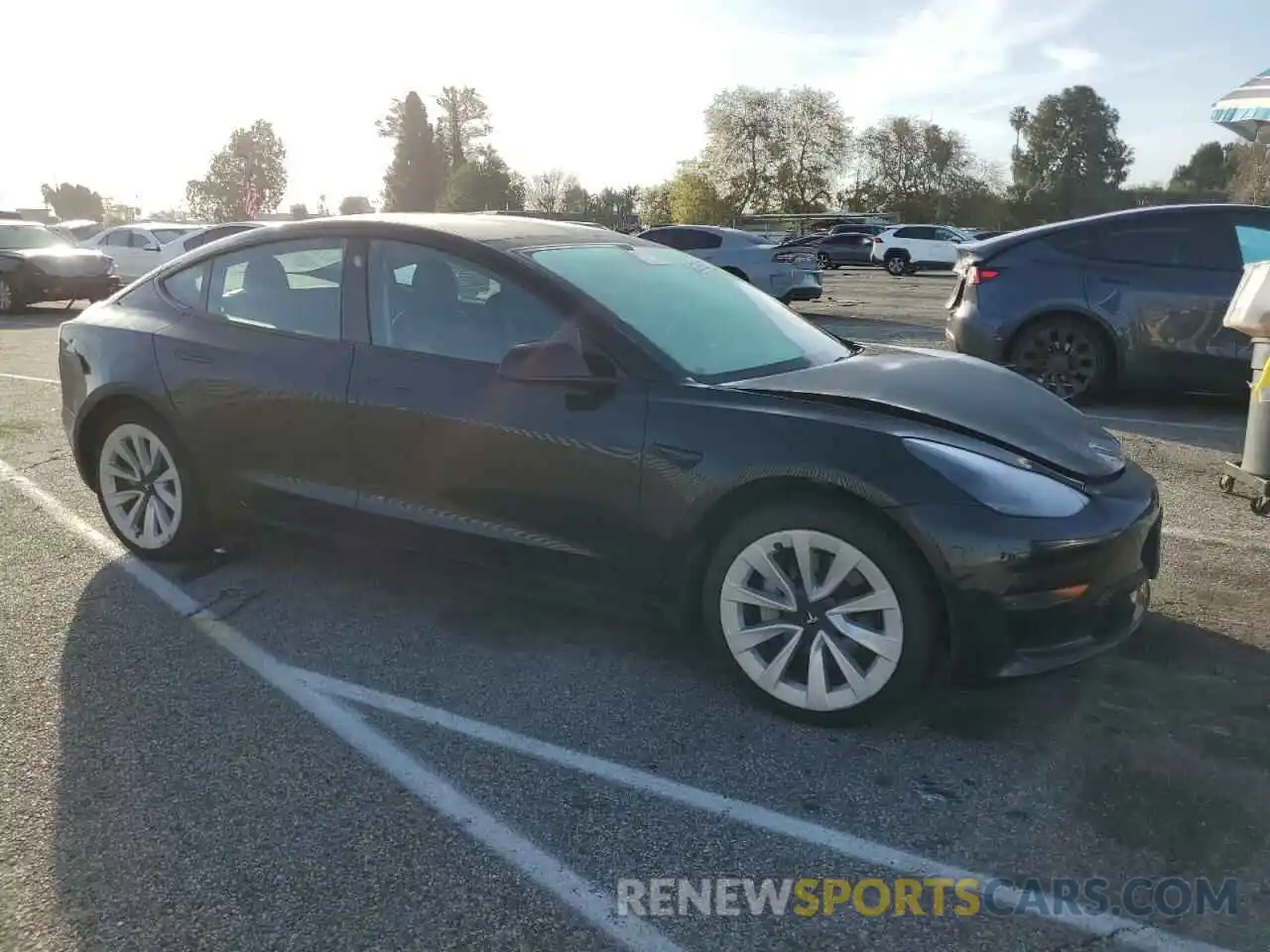 4 Photograph of a damaged car 5YJ3E1EA9NF290091 TESLA MODEL 3 2022