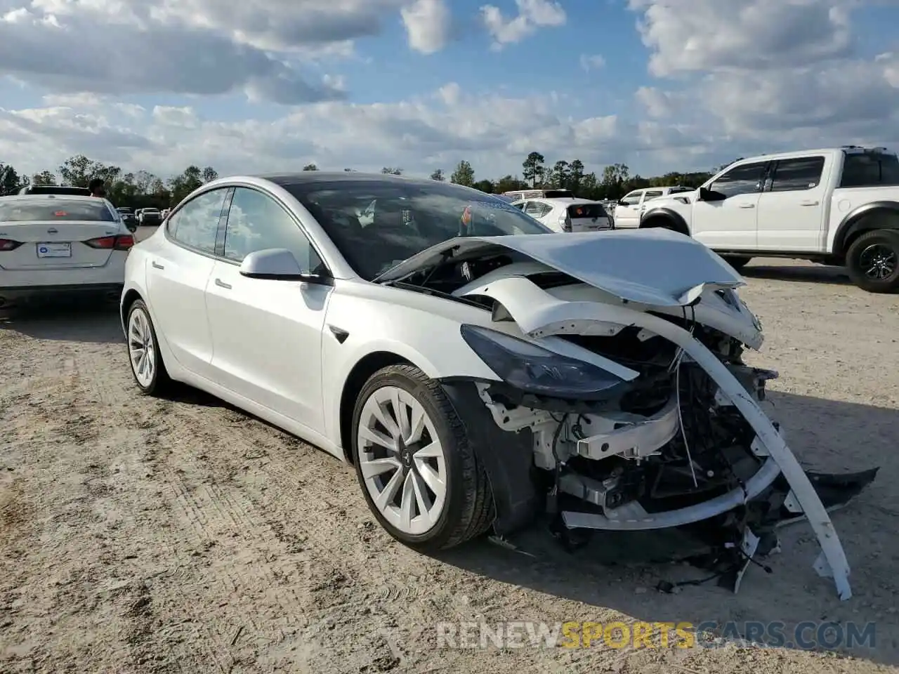 4 Photograph of a damaged car 5YJ3E1EA9NF310713 TESLA MODEL 3 2022