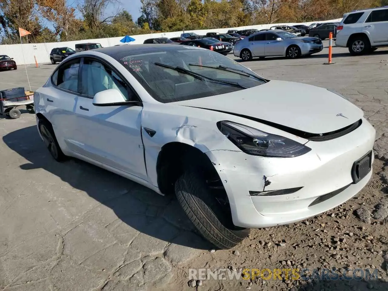 4 Photograph of a damaged car 5YJ3E1EA9NF368613 TESLA MODEL 3 2022