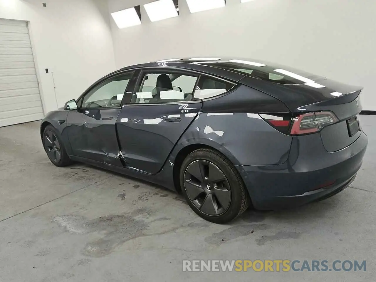 2 Photograph of a damaged car 5YJ3E1EA9NF369387 TESLA MODEL 3 2022
